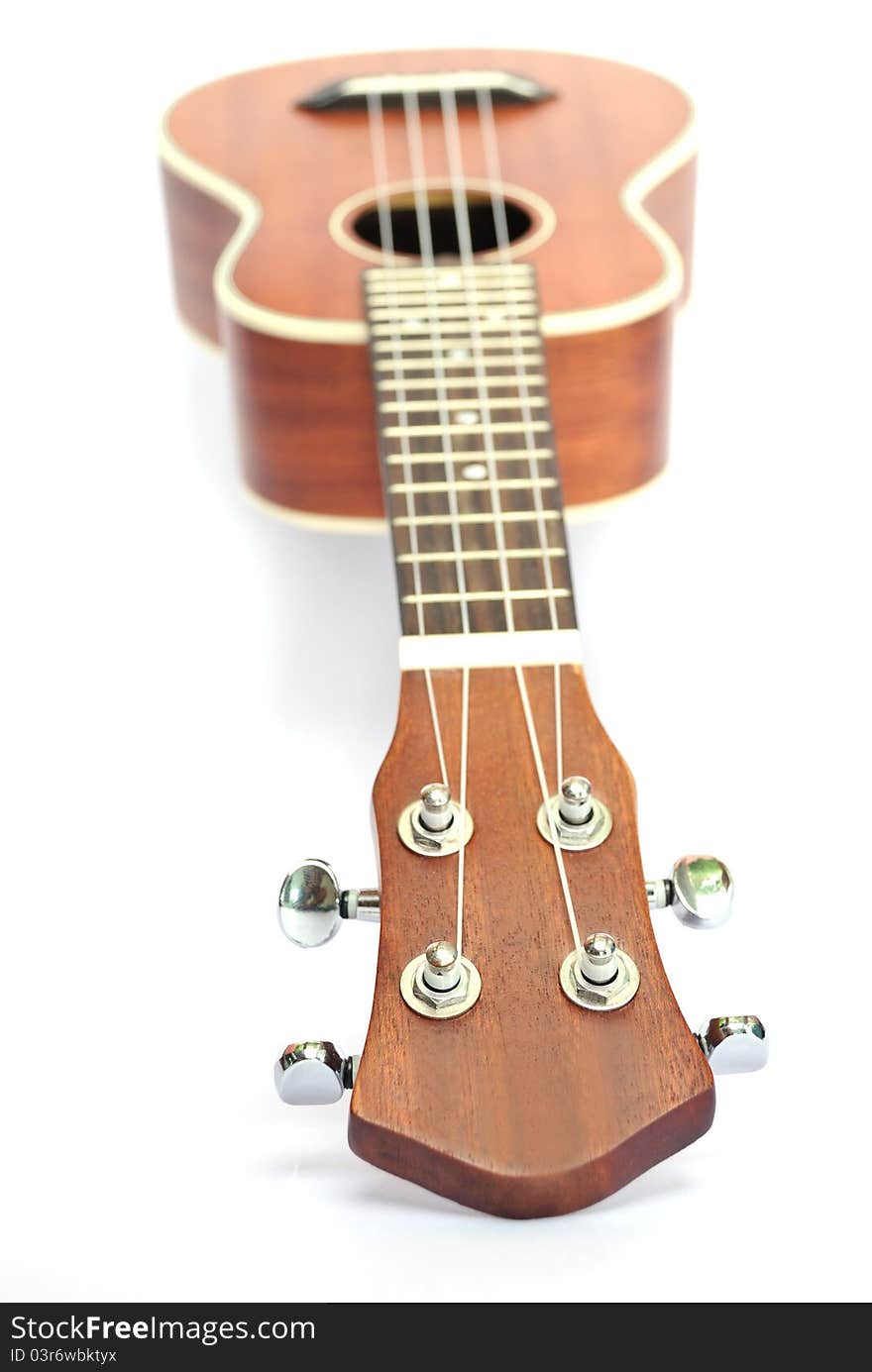 Ukulele On The White Background