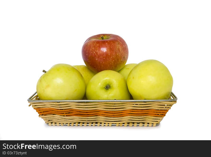 Apples in a basket on a white background. Apples in a basket on a white background