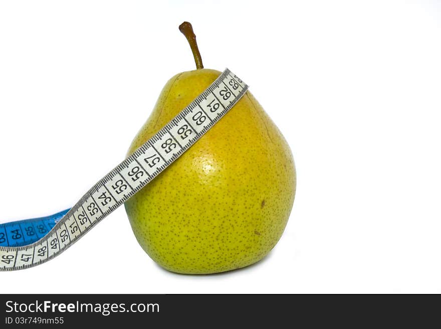 Ripe green pear with measuring tape. Ripe green pear with measuring tape