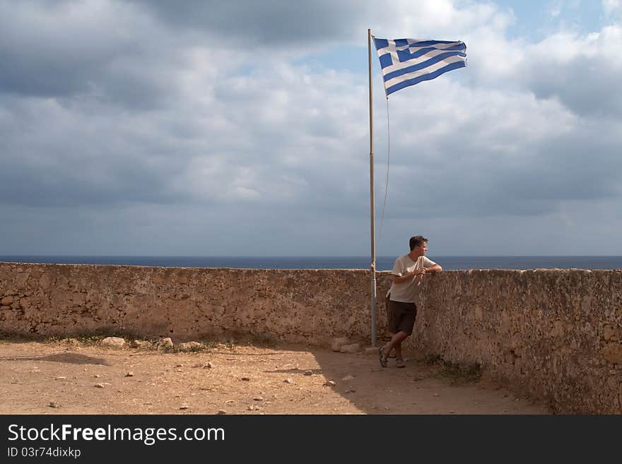 Youth On Stone Castle Under The Greece Flag