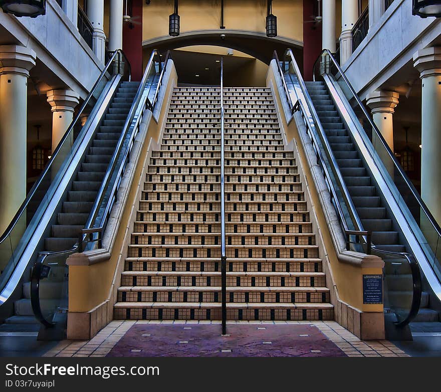 Two escalators and a large Spanish tile staircase. Two escalators and a large Spanish tile staircase