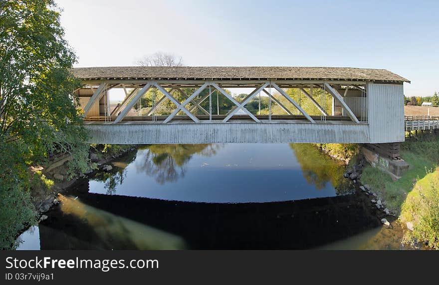 Gilkey Covered Bridge Over Creek in Oregon Panorama. Gilkey Covered Bridge Over Creek in Oregon Panorama