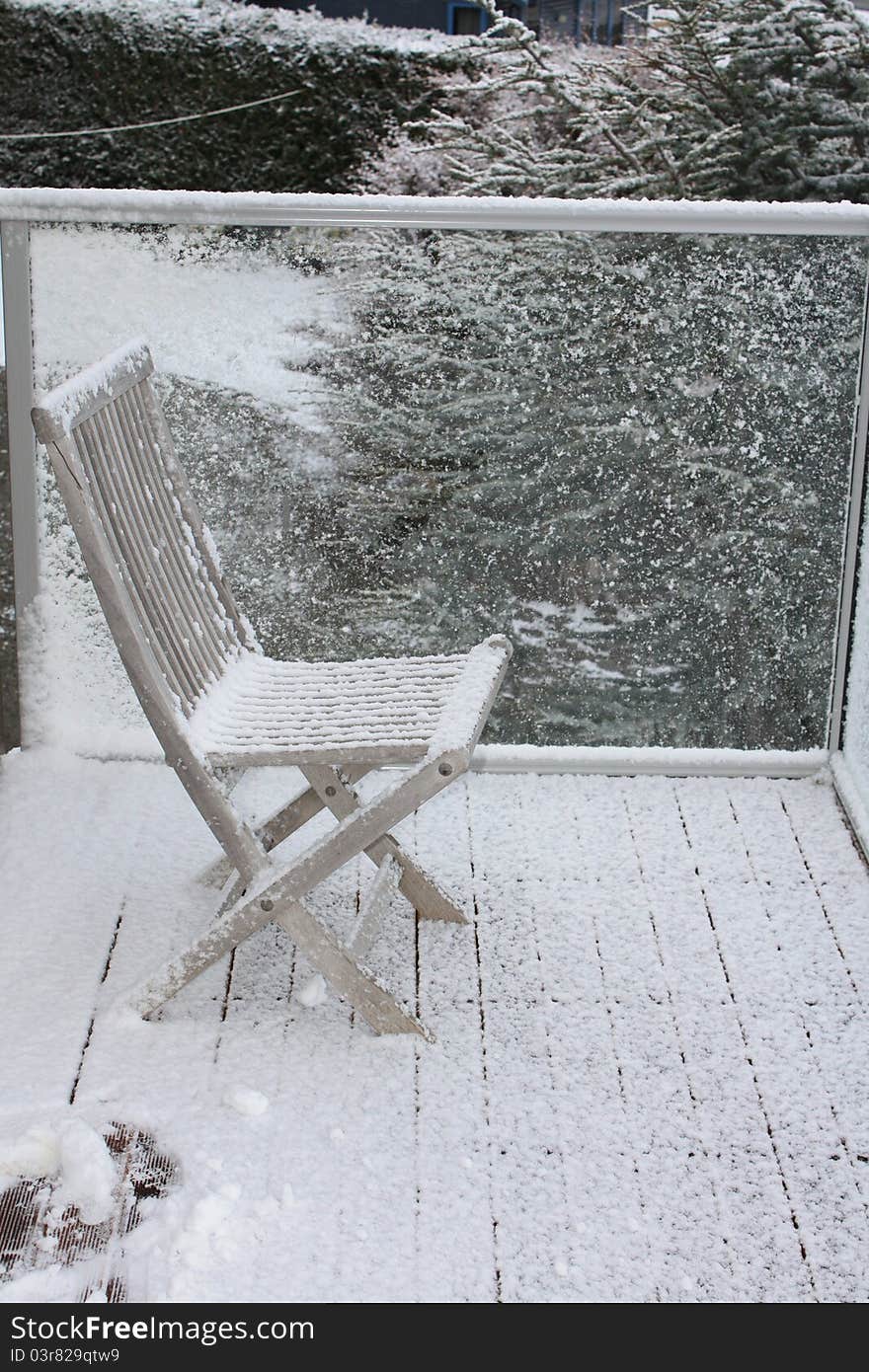 Snow On Wooden Chair