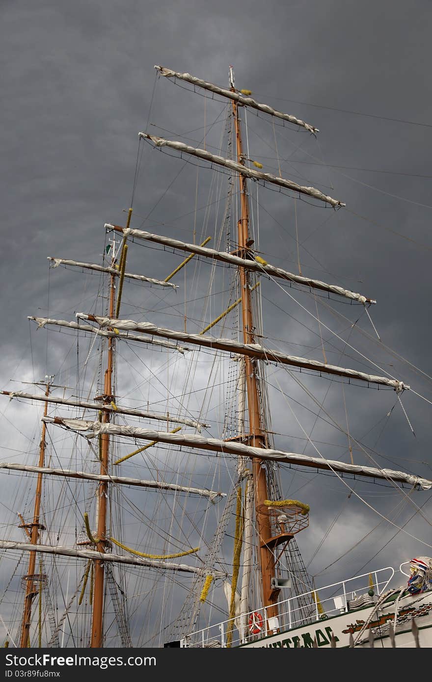 Masts with storm bringer grey sky. Masts with storm bringer grey sky