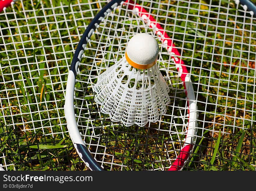 The picture of badminton rackets and shuttlecock