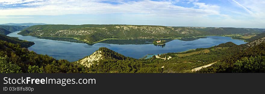 Panorama of Krka river and the island and monaster