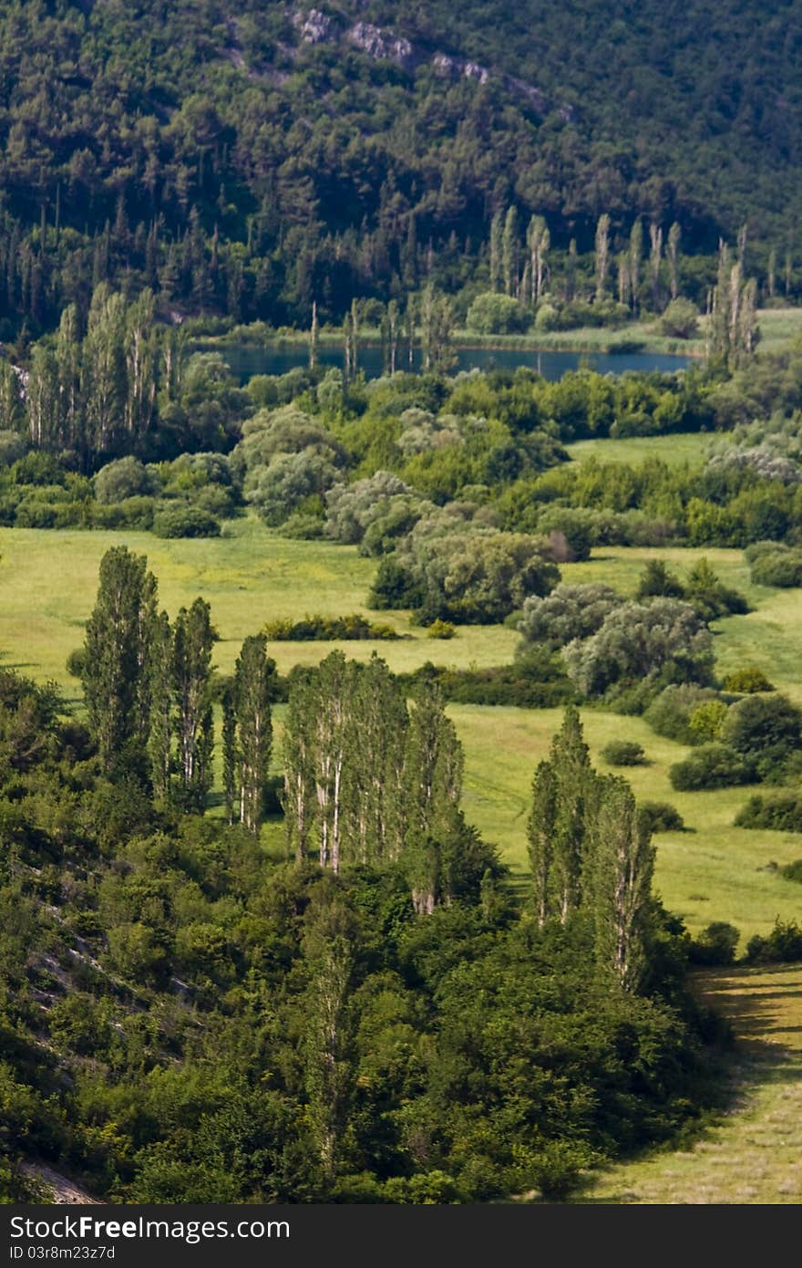 Fruitful valley of the Krka river part of the National park Krka