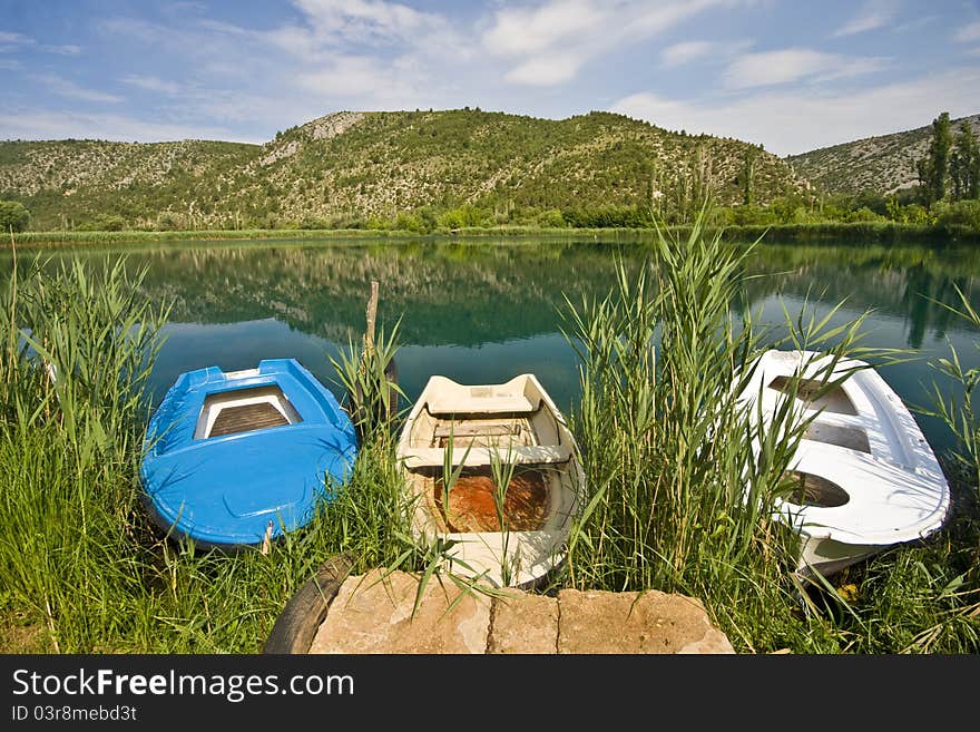 River boats berthed on a pier in the National park Krka. River boats berthed on a pier in the National park Krka