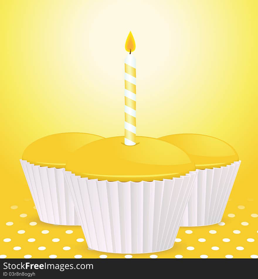 Yellow cupcakes, one with birthday candle on a yellow polka dot background. Yellow cupcakes, one with birthday candle on a yellow polka dot background