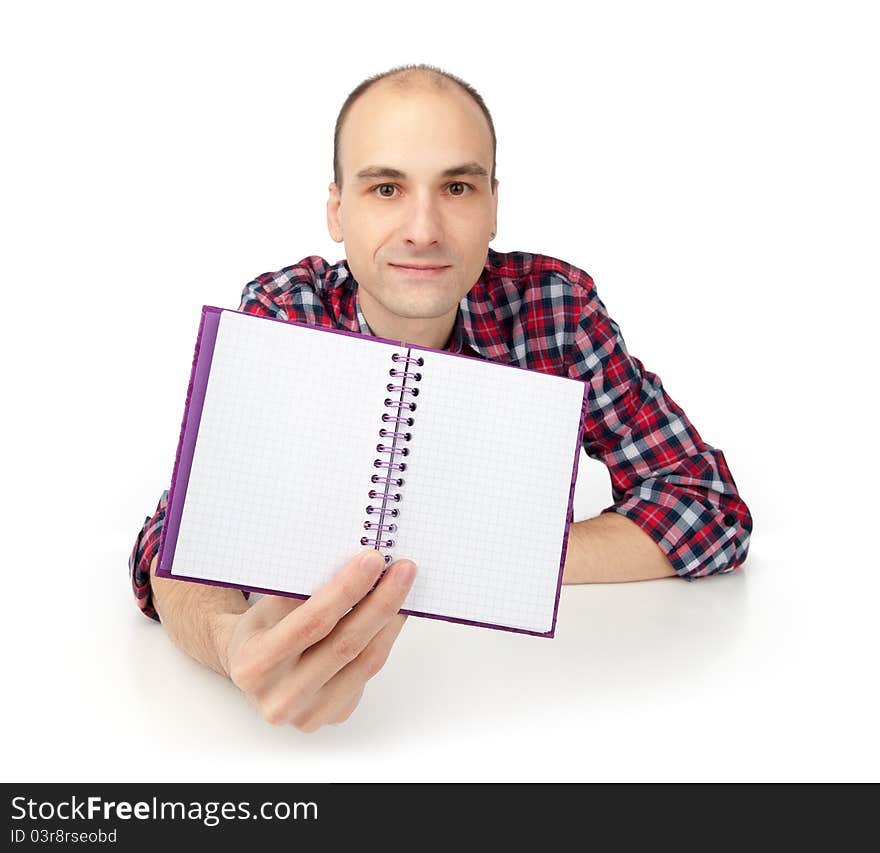 Bald young man showing notepad