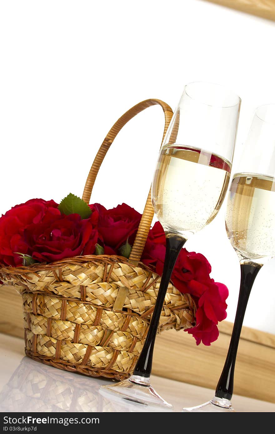 Basket with roses and champagne