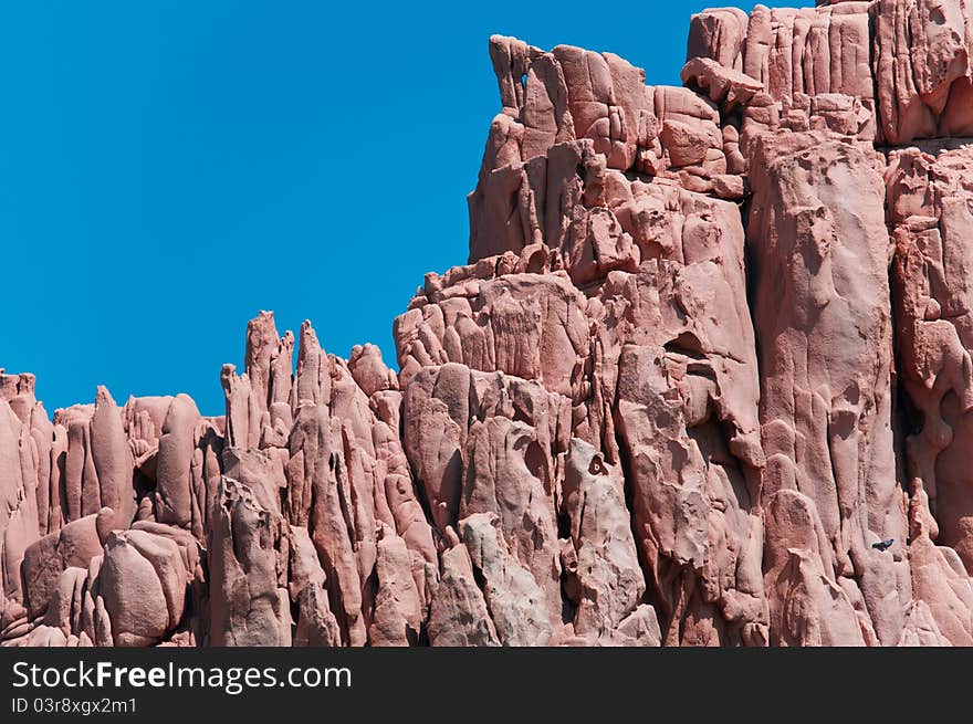 Rocks similar to the red planet Mars and rocks by the sea. Rocks similar to the red planet Mars and rocks by the sea