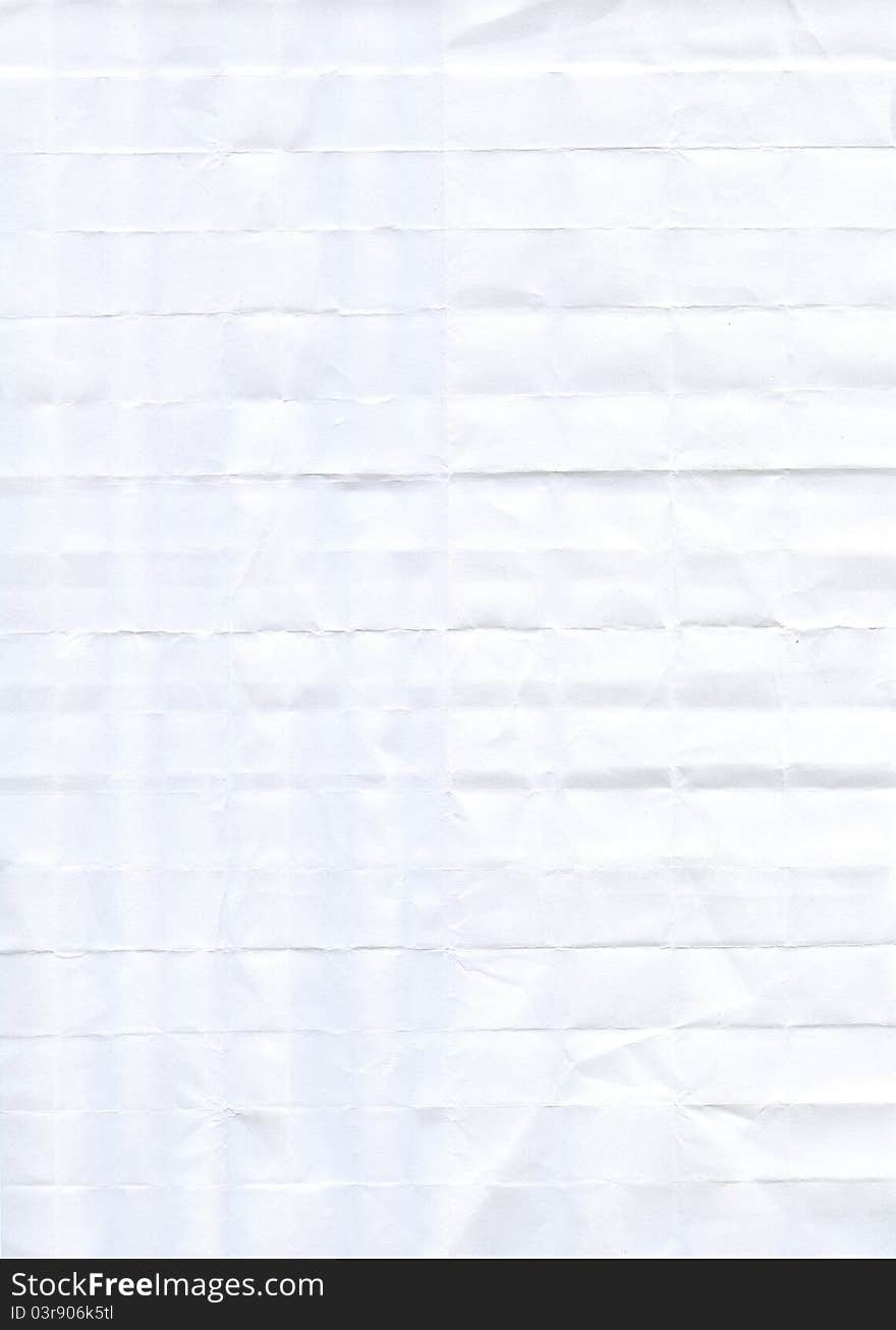 White folded wastepaper with square texture