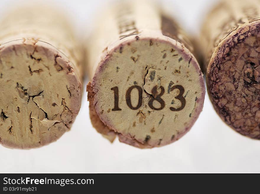 Simple studio shot of three wine corks. Focus on 1st cork, shallow DOF. Simple studio shot of three wine corks. Focus on 1st cork, shallow DOF.