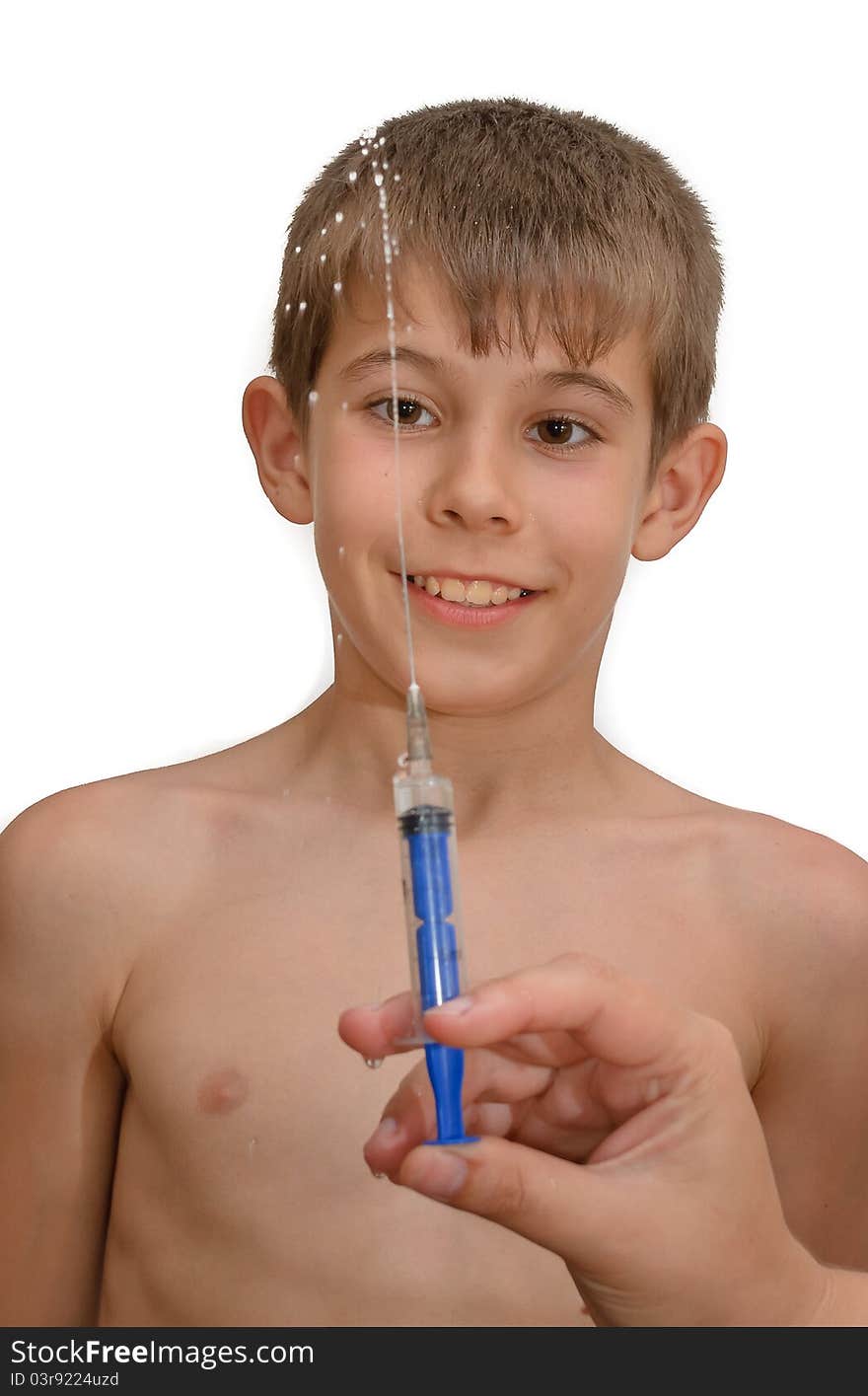 The boy and the syringe. Isolated on white background