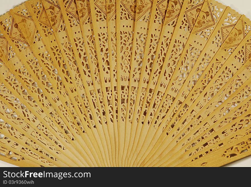 Close view of a wooden japanese fan texture