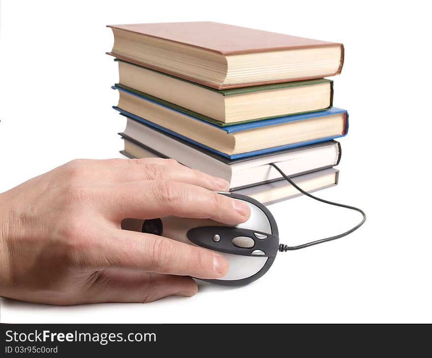 Color photo of an stack books and mouse. Color photo of an stack books and mouse