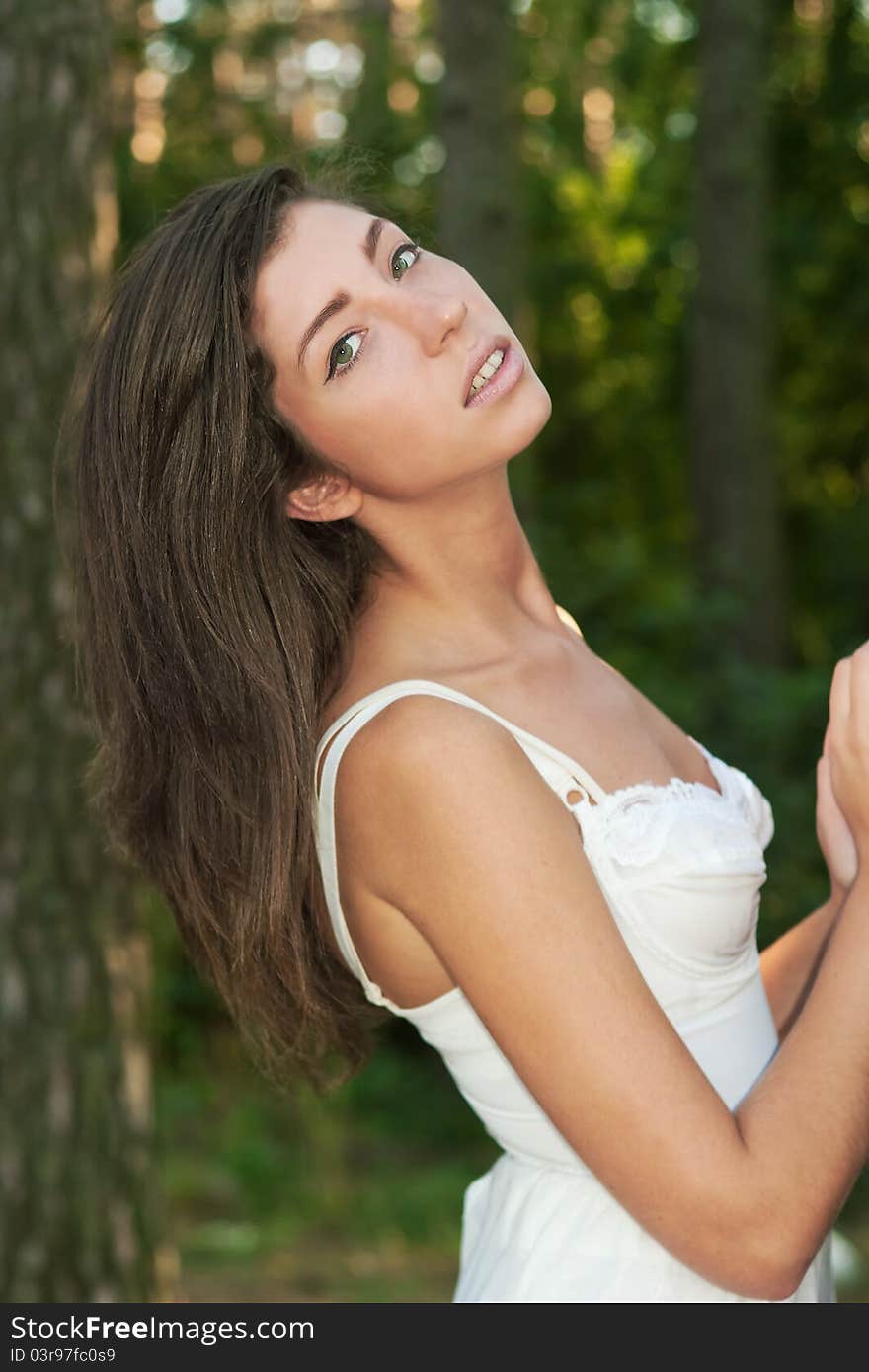 Girl near tree in summer forest. Girl near tree in summer forest