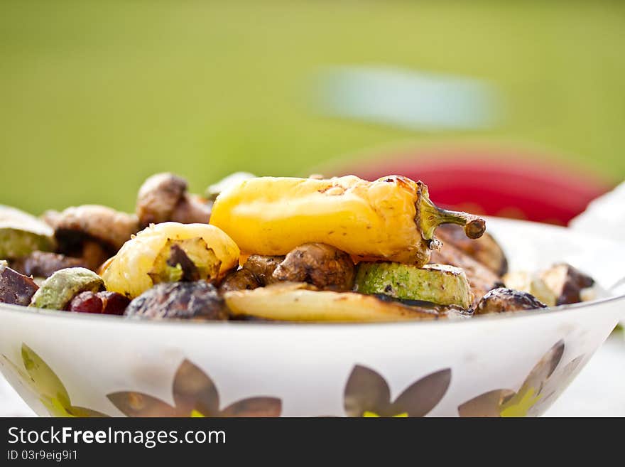 Different grilled vegetables baked in the outdoors. Different grilled vegetables baked in the outdoors