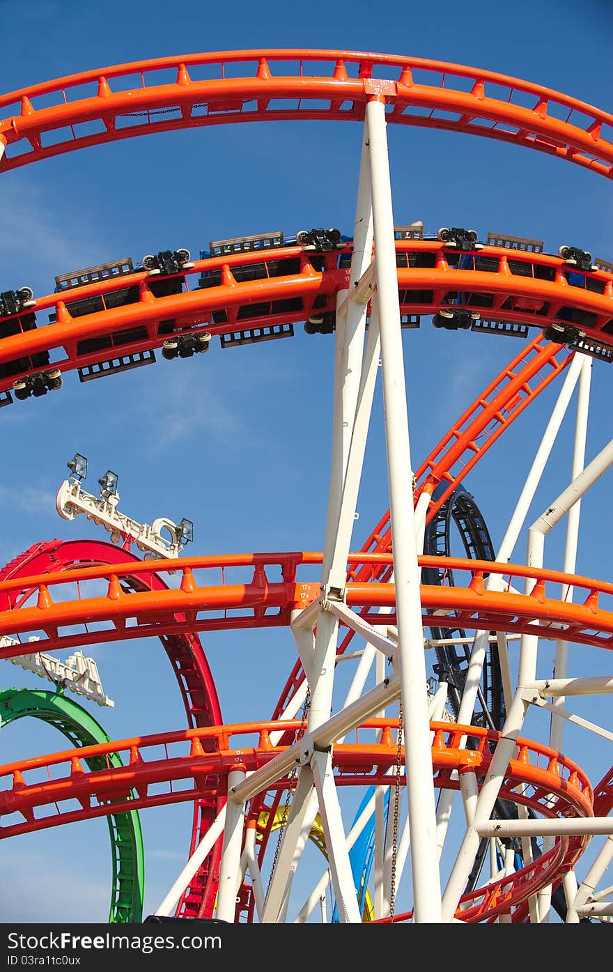 Roller coaster construction with the rails, trolley and lamps