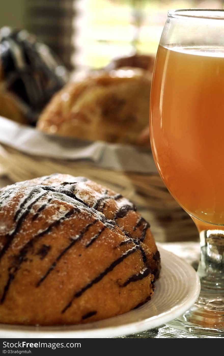 Delicious Chocolate bread  served as breakfast and orange juice as the drinks. Great images for food and beverages article or any design involving food and drinks. Delicious Chocolate bread  served as breakfast and orange juice as the drinks. Great images for food and beverages article or any design involving food and drinks.