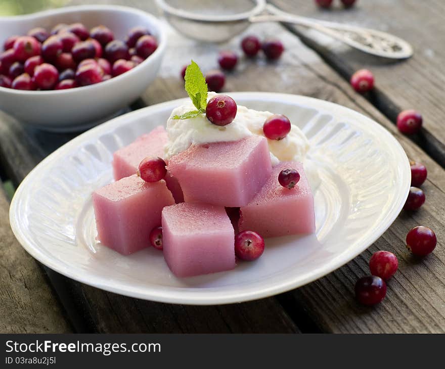 Delicious dessert with sweet cream and fresh berries. Seelctive focus