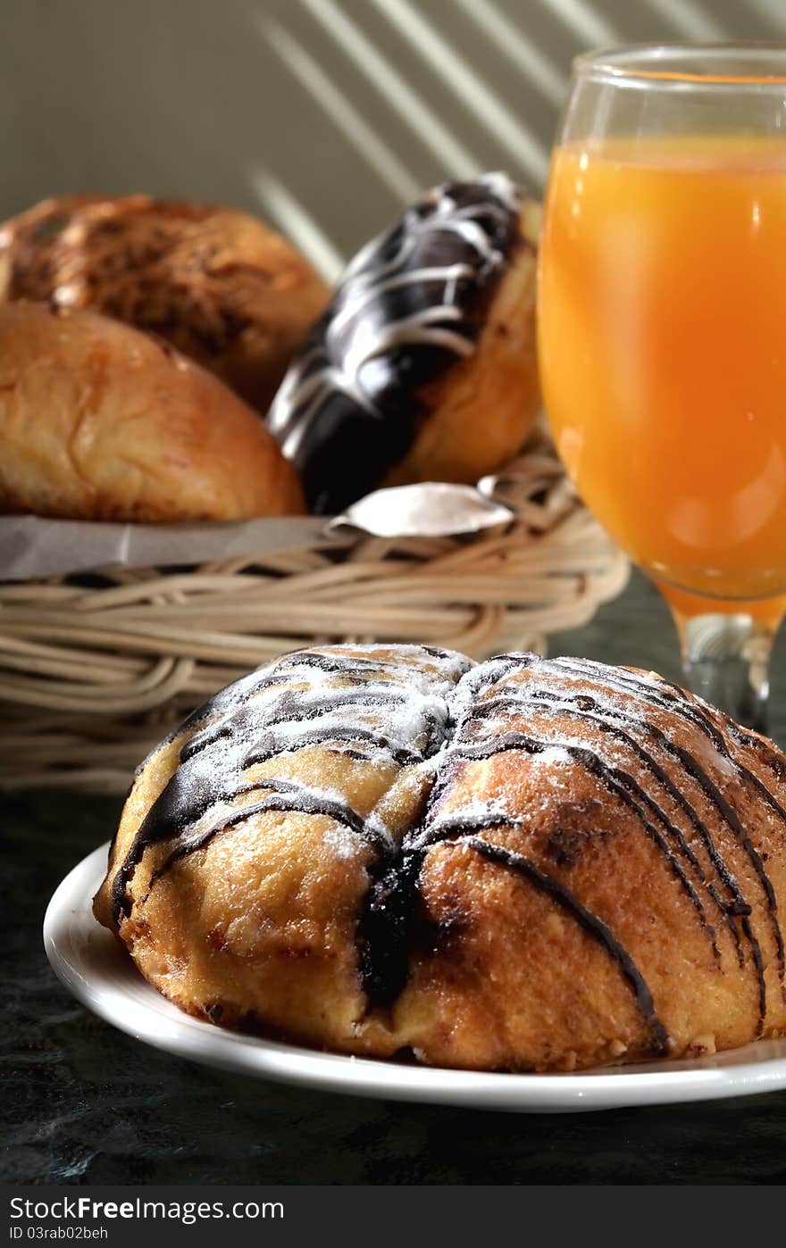 Chocolate bread and orange juice