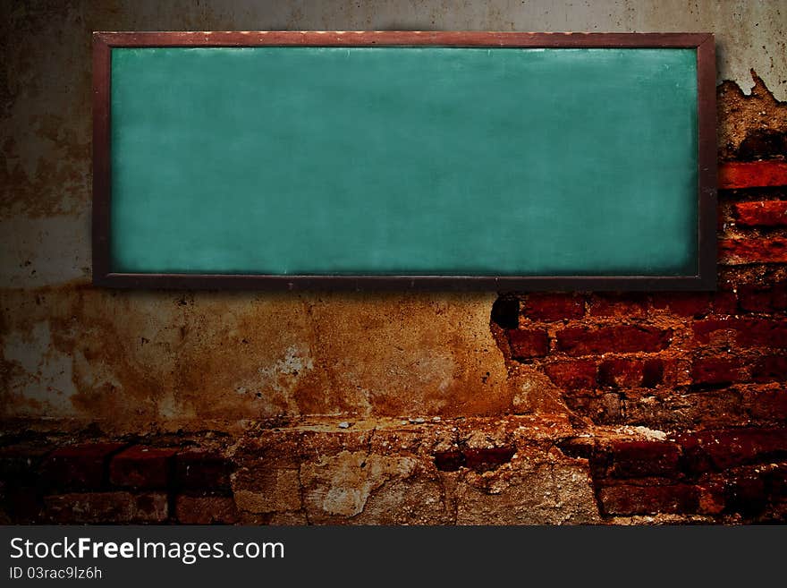 Wooden chalk board on grunge brick wall. Wooden chalk board on grunge brick wall