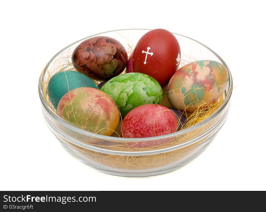 Easter varicoloured eggs on a glass