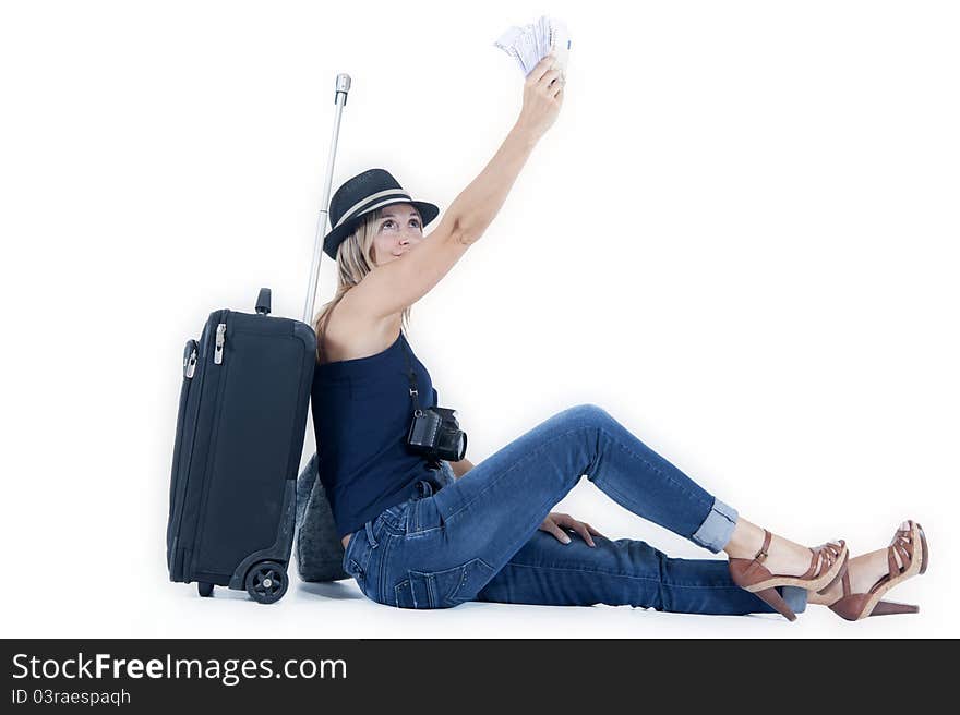 Tourist woman traveling with her luggage, cash and a camera. Tourist woman traveling with her luggage, cash and a camera