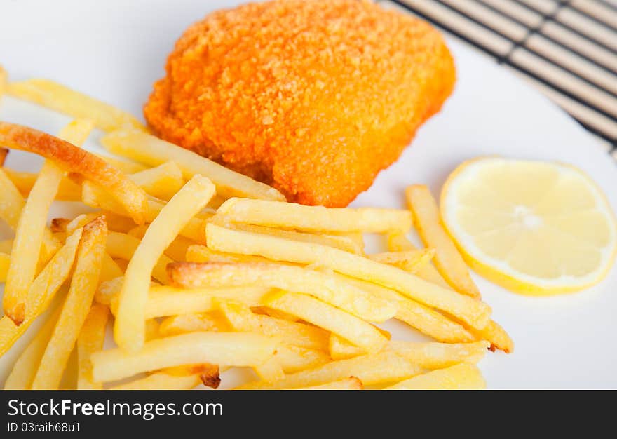 Quick fried meal: schnitzel with french fries