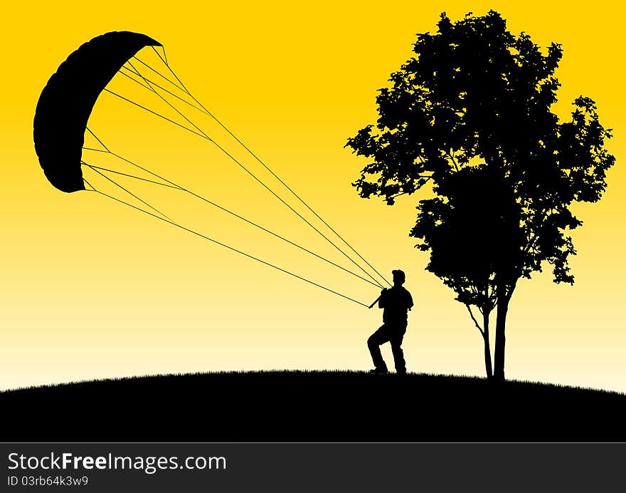 Man Flying Stunt Kite On Hill By A Tree