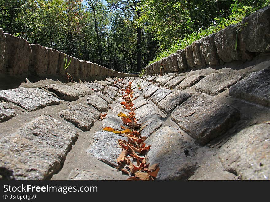 V Shaped Stone Gutter In A Park