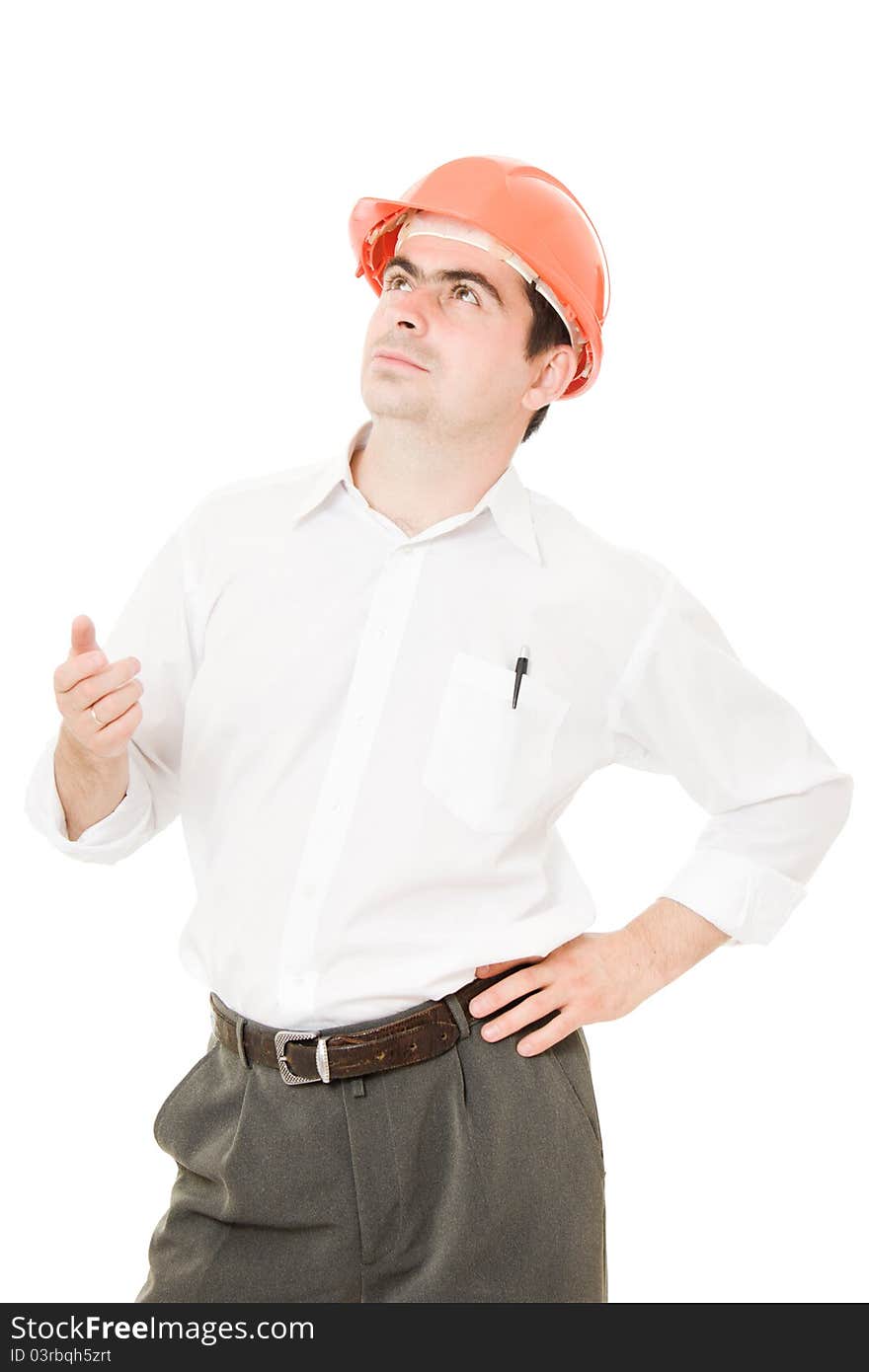 Businessman in a helmet looking up on a white background. Businessman in a helmet looking up on a white background.