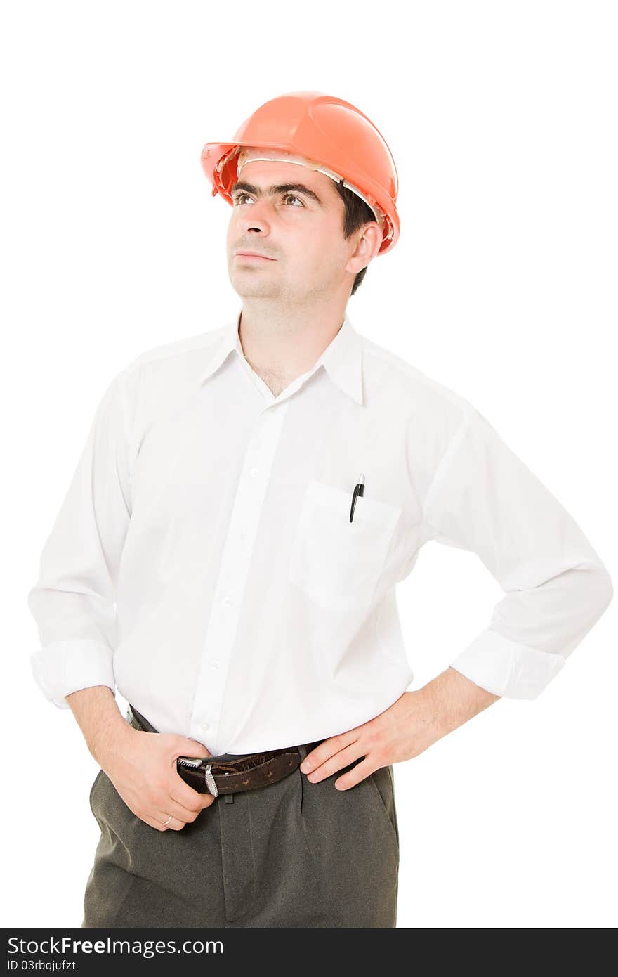 Businessman in a helmet looking up on a white background. Businessman in a helmet looking up on a white background.