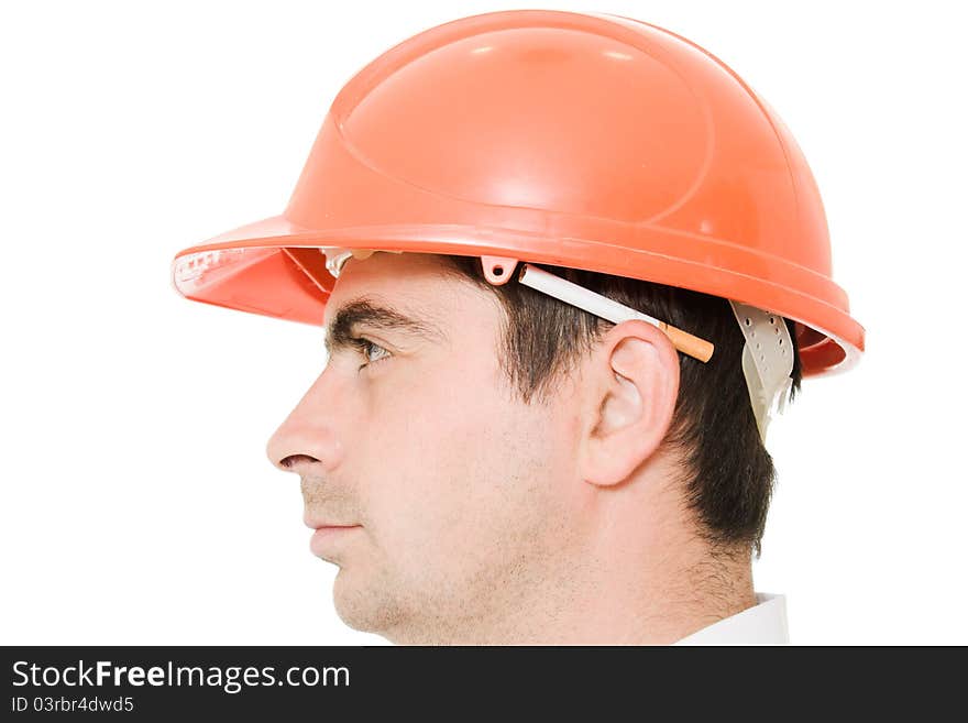 Businessman in a helmet with a cigarette on a white background. Businessman in a helmet with a cigarette on a white background.