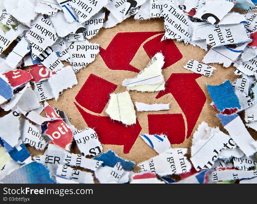 Recycle Symbol With Pieces Of Paper