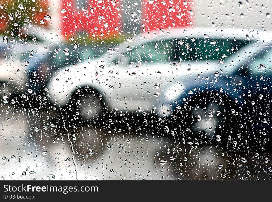 Glass covered with raindrops.