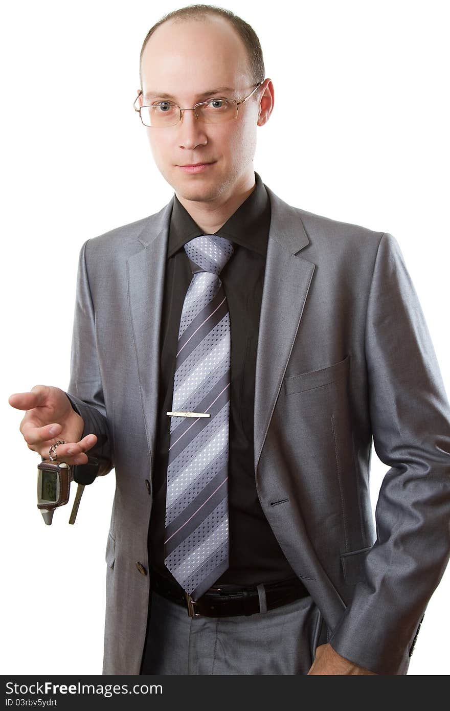 Elegant Man With Car Keys On A White Background