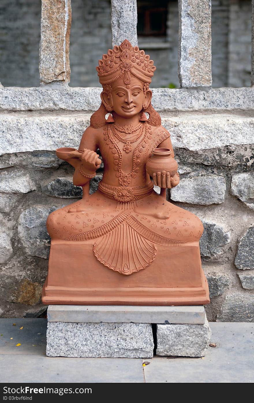 A traditional Indian goddess made of clay at display