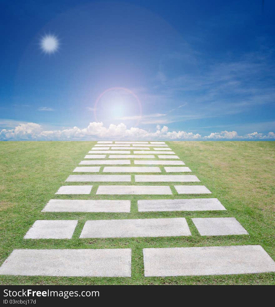 Abstract picture of nice form of walkpath on grass field with blue sky. Abstract picture of nice form of walkpath on grass field with blue sky.