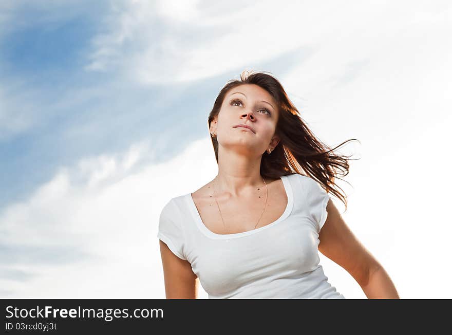 Happy young woman outdoors, summer time