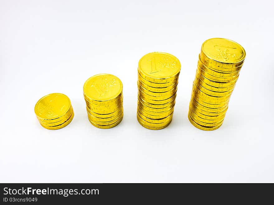 Golden coin tower on white background