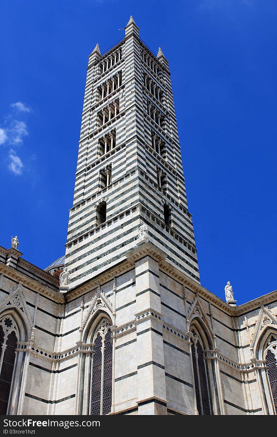 Tower of the Cathedral of Siena, a medieval church in Siena, Italy. Tower of the Cathedral of Siena, a medieval church in Siena, Italy