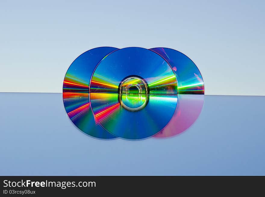 Three Dvd Discs On Mirror