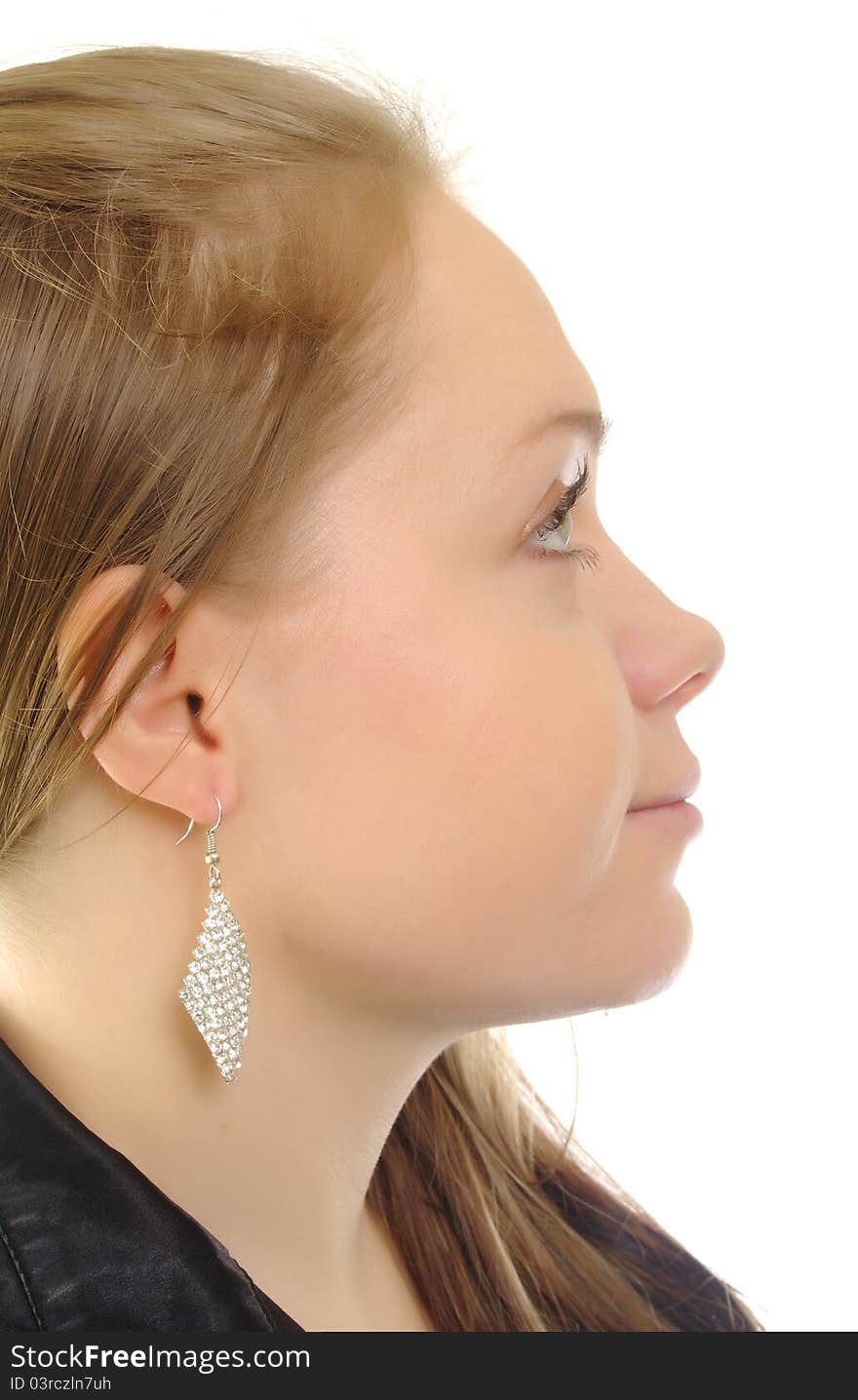 Portrait of beautiful girl with earrings