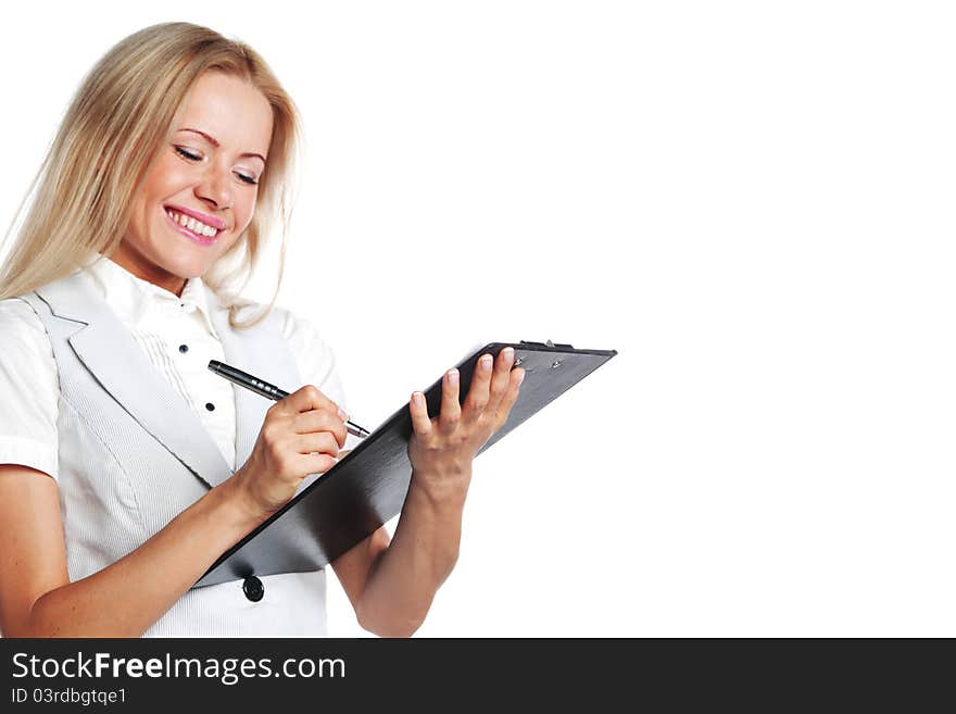 Business woman writing in notebook on a white background