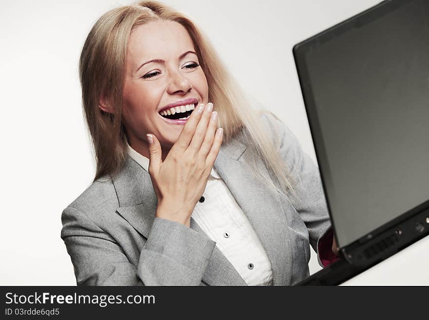 Business woman working on black laptop. Business woman working on black laptop