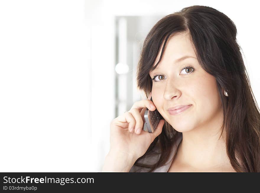 Portrait of businesswoman talking on cell phone