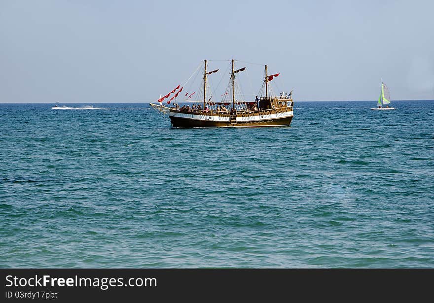 Cruiser with tourists in sea